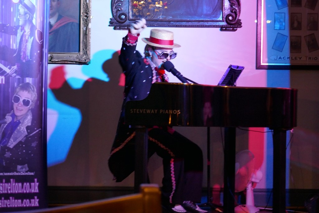 Sam Hughe's is Elton John