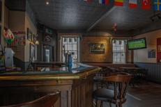 The bar in the Darts & Pool Room